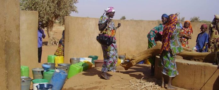 locals_fetching_water_a1